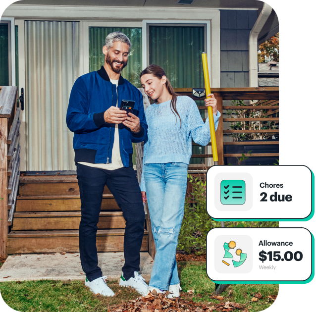 Father giving daughter chore money with Greenlight card